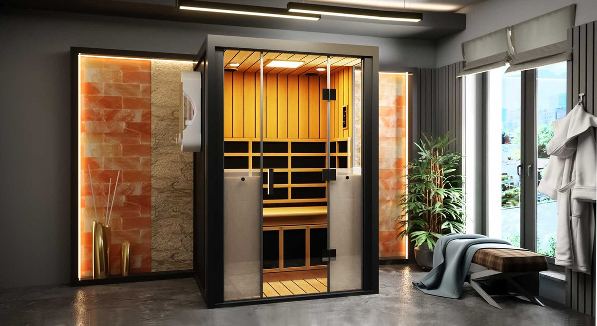 HaloSauna 2-person salt and infrared sauna cabin with glass doors and a lit cedar-tone interior