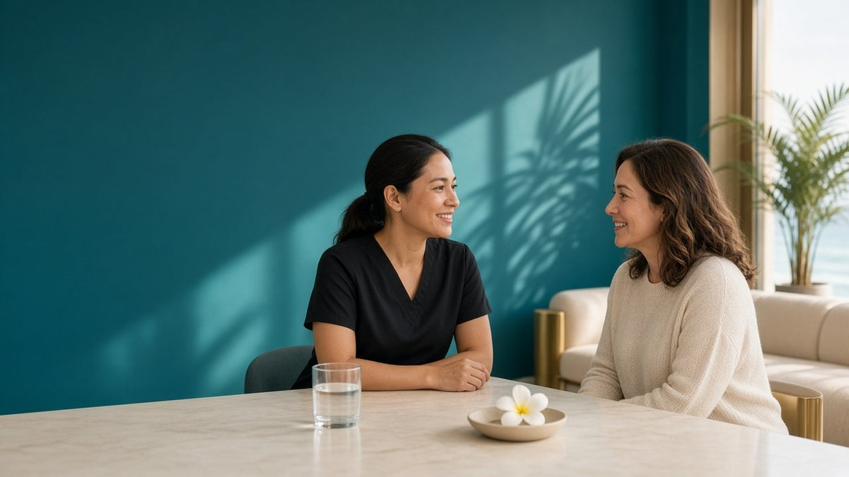 Hidration nurse talking with a client during a weight loss consultation
